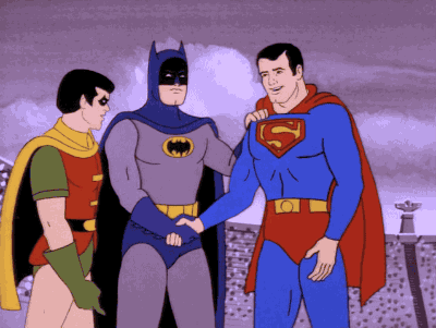 superheroes shaking hands
